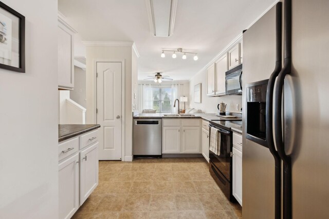kitchen featuring white cabinets, crown molding, ceiling fan, a sink, and black appliances