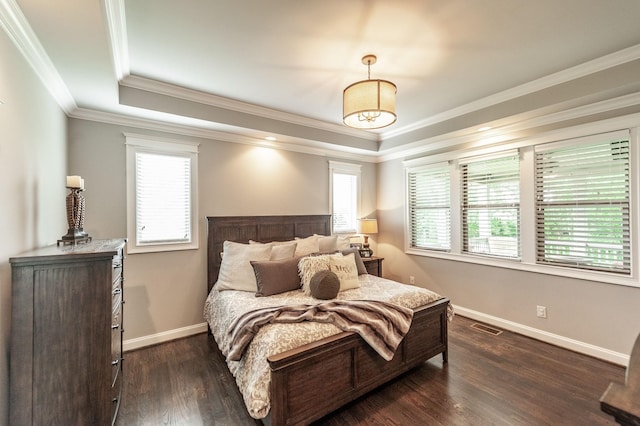 1092 Summerstar Cir, Gallatin, TN 37066 - bedroom featuring a raised ceiling, baseboards, dark wood-type flooring, visible vents, and ornamental molding