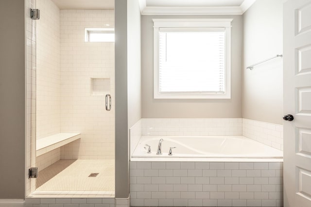 1092 Summerstar Cir, Gallatin, TN 37066 - bathroom featuring ornamental molding, a garden tub, and a stall shower