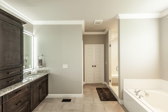 1092 Summerstar Cir, Gallatin, TN 37066 - full bathroom with visible vents, ornamental molding, a garden tub, and vanity