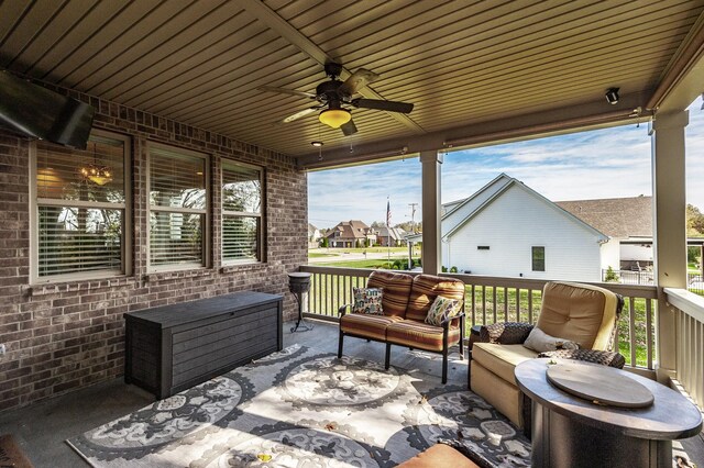 1092 Summerstar Cir, Gallatin, TN 37066 - view of patio with ceiling fan, an outdoor living space, and a residential view