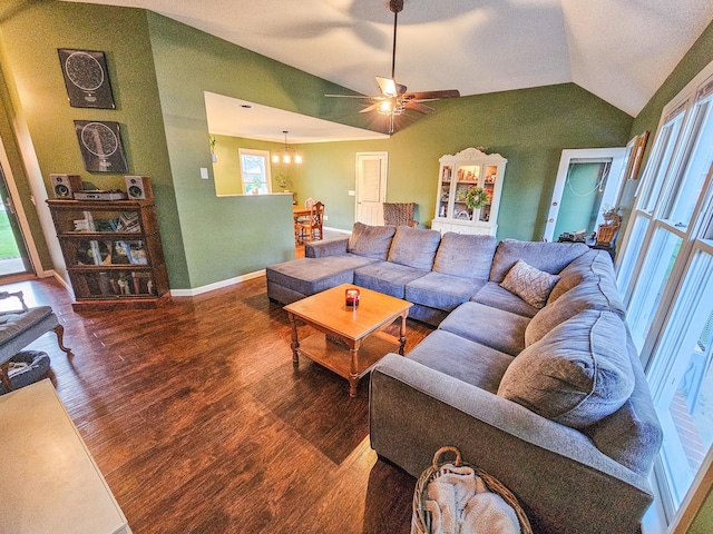 103 Hillcrest Dr, Tullahoma, TN 37388 - living area with a ceiling fan, wood finished floors, vaulted ceiling, a chandelier, and baseboards