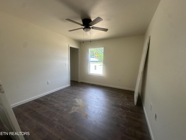 2765 Banner Springs Rd, Jamestown, TN 38556 - unfurnished room featuring dark wood-style floors, baseboards, and ceiling fan