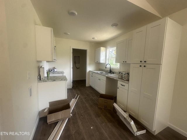 2765 Banner Springs Rd, Jamestown, TN 38556 - kitchen featuring a sink, baseboards, white cabinets, dark wood finished floors, and stove