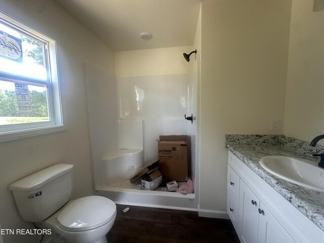 2765 Banner Springs Rd, Jamestown, TN 38556 - full bathroom featuring walk in shower, toilet, vanity, and wood finished floors