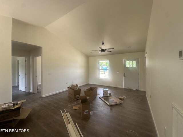 2765 Banner Springs Rd, Jamestown, TN 38556 - unfurnished living room featuring baseboards, vaulted ceiling, wood finished floors, and ceiling fan