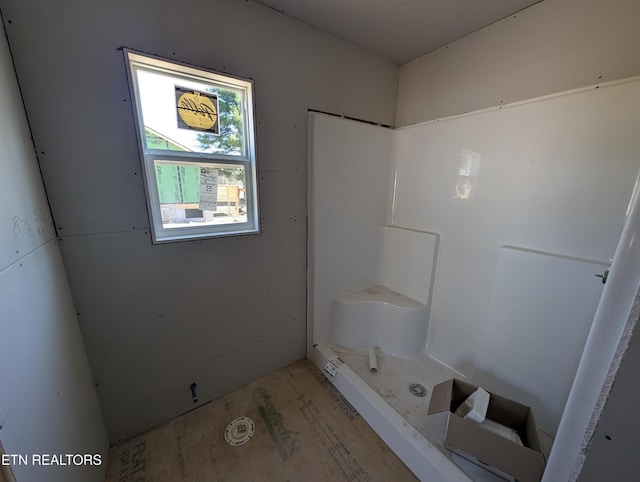 bathroom with walk in shower