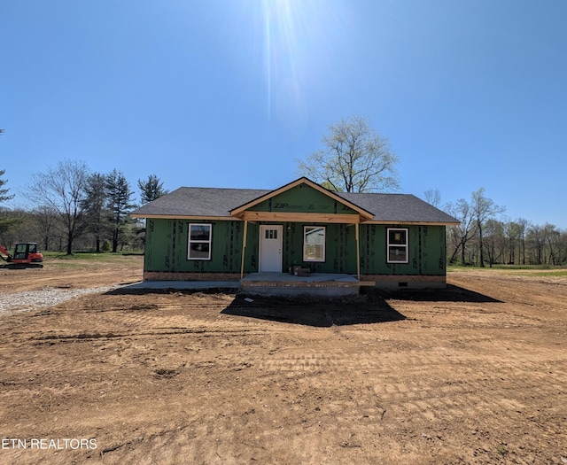 view of front facade featuring covered porch and crawl space