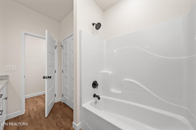 552 Vista View Pkwy, Jamestown, TN 38556 - full bathroom featuring baseboards,  shower combination, wood finished floors, and vanity