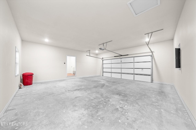 552 Vista View Pkwy, Jamestown, TN 38556 - garage with baseboards, a garage door opener, and electric panel