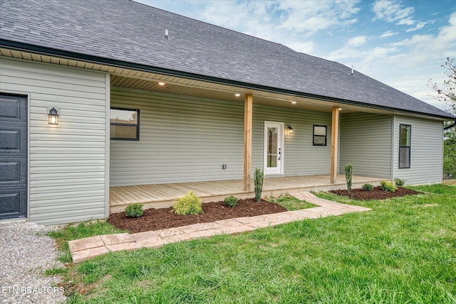 552 Vista View Pkwy, Jamestown, TN 38556 - view of front facade featuring roof with shingles, covered porch, and a front lawn