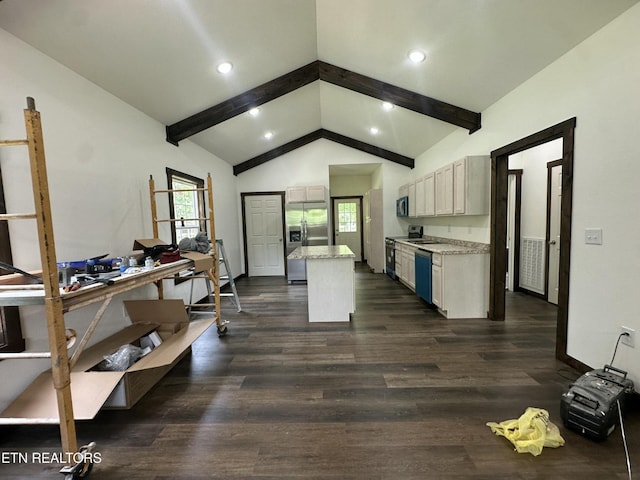 1173 Terry Ln, Jamestown, TN 38556 - kitchen with stainless steel appliances, a kitchen island, dark wood-style floors, light stone counters, and recessed lighting