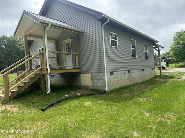 1173 Terry Ln, Jamestown, TN 38556 - view of side of property with crawl space, a yard, and stairway