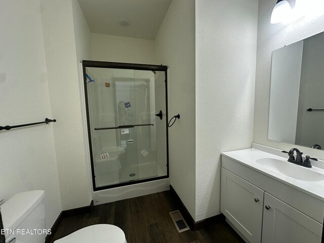 1173 Terry Ln, Jamestown, TN 38556 - full bathroom with a shower stall, wood finished floors, and vanity