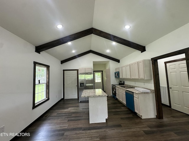 1173 Terry Ln, Jamestown, TN 38556 - kitchen featuring stainless steel fridge, range with electric stovetop, dishwashing machine, dark wood-style floors, and a center island
