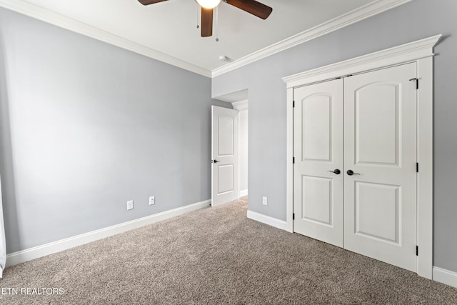 8508 Flowering Peach Ln, Knoxville, TN 37923 - unfurnished bedroom with carpet floors, crown molding, a closet, baseboards, and ceiling fan