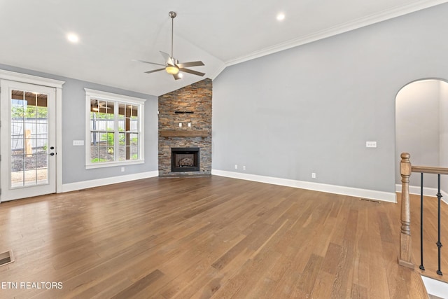 8508 Flowering Peach Ln, Knoxville, TN 37923 - unfurnished living room with baseboards, ceiling fan, wood finished floors, and lofted ceiling