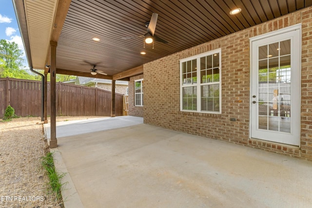 8508 Flowering Peach Ln, Knoxville, TN 37923 - view of patio / terrace with a ceiling fan and fence