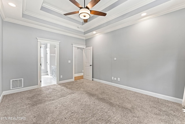 8508 Flowering Peach Ln, Knoxville, TN 37923 - unfurnished bedroom featuring light carpet, a raised ceiling, recessed lighting, visible vents, and ornamental molding