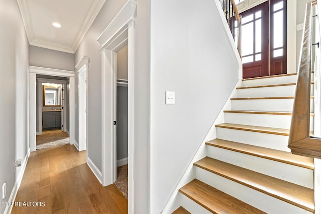 8508 Flowering Peach Ln, Knoxville, TN 37923 - staircase with crown molding, recessed lighting, baseboards, and wood finished floors