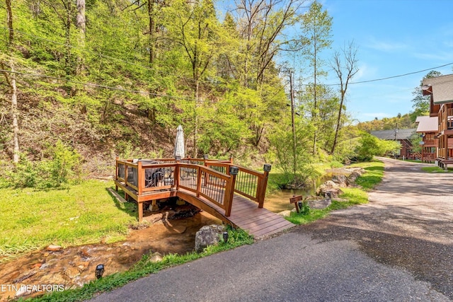 view of property's community with a wooden deck