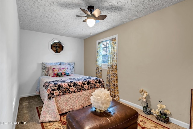 2220 Thorn Grove Pike, Knoxville, TN 37914 - bedroom featuring baseboards, a ceiling fan, a textured ceiling, and carpet