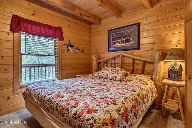 415 Silver Maple Ln, Gatlinburg, TN 37738 - bedroom featuring carpet flooring, wooden walls, wooden ceiling, and beam ceiling
