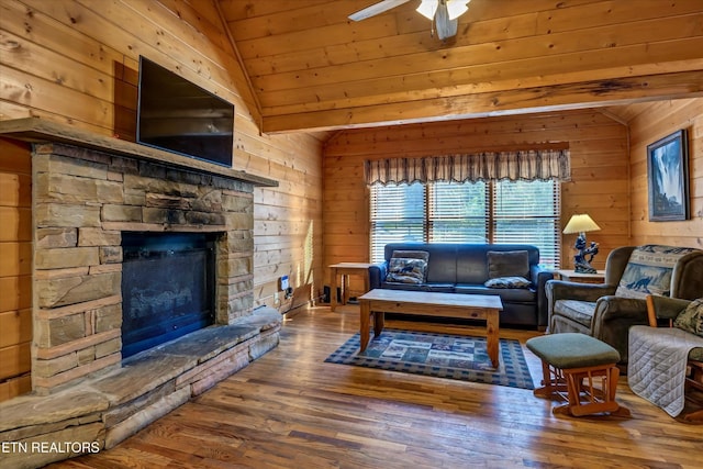 415 Silver Maple Ln, Gatlinburg, TN 37738 - living area with vaulted ceiling, wood walls, and wood finished floors