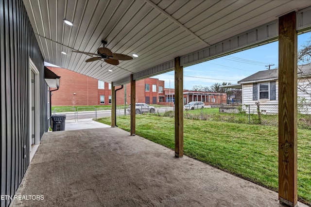 view of patio / terrace featuring fence and a ceiling fan
