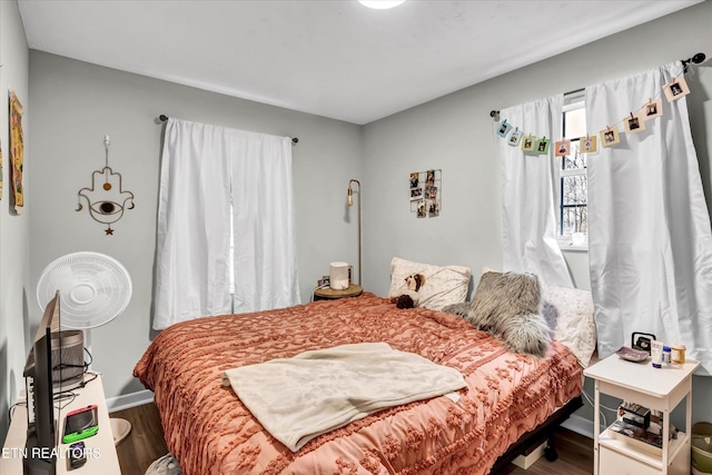 1606 Sexton Ln, Knoxville, TN 37932 - bedroom with baseboards and wood finished floors