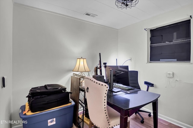 1606 Sexton Ln, Knoxville, TN 37932 - office area featuring baseboards, visible vents, and wood finished floors