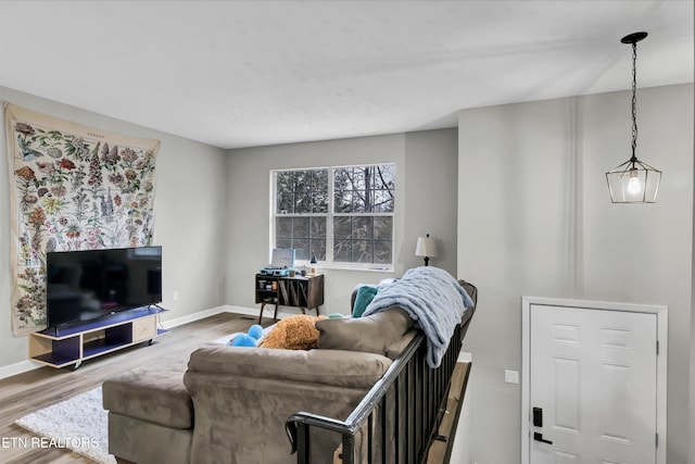 1606 Sexton Ln, Knoxville, TN 37932 - living room featuring baseboards and wood finished floors