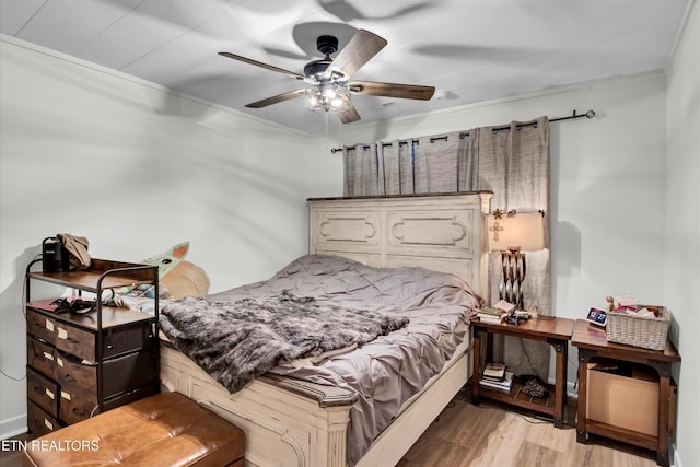 1606 Sexton Ln, Knoxville, TN 37932 - bedroom with a ceiling fan and wood finished floors