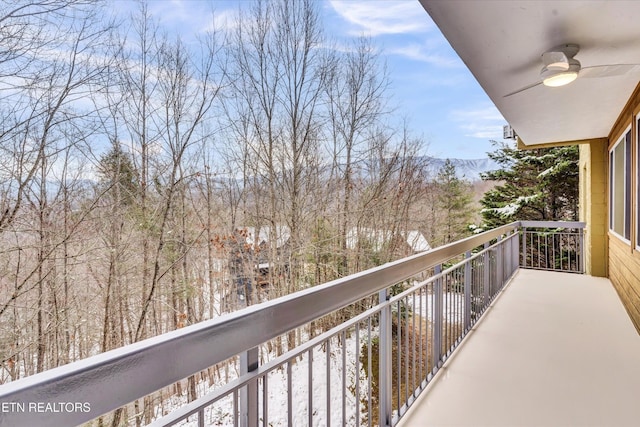 balcony featuring ceiling fan