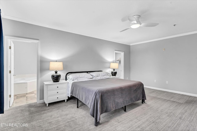 carpeted bedroom featuring a ceiling fan, baseboards, ornamental molding, and ensuite bathroom