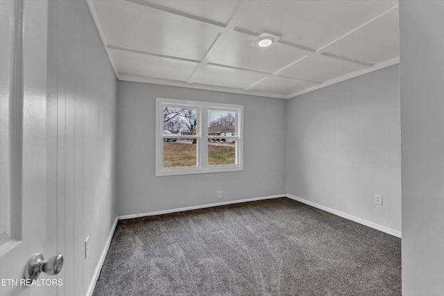 carpeted empty room with baseboards and coffered ceiling