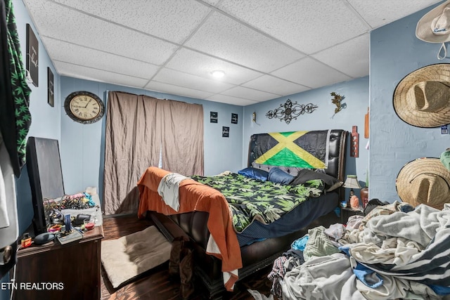 565567 W Outer Dr, Oak Ridge, TN 37830 - bedroom with wood finished floors and a paneled ceiling