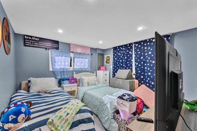 bedroom with recessed lighting