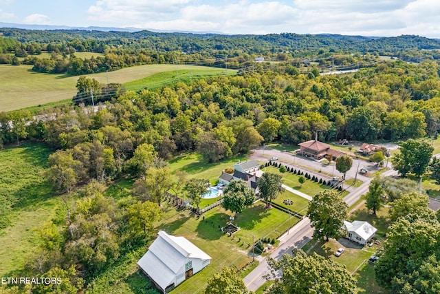 aerial view featuring a view of trees