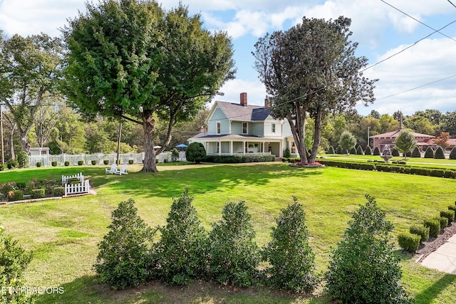 view of yard featuring fence