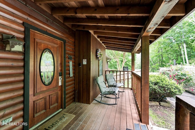 deck with covered porch