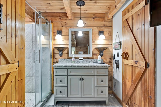 full bath featuring beam ceiling, wood walls, a shower stall, and wood ceiling