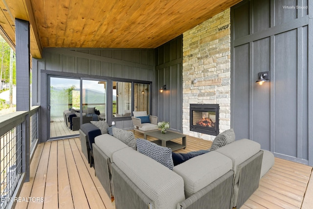 261 Browns Ridge Rd, Gatlinburg, TN 37738 - deck with an outdoor living space with a fireplace