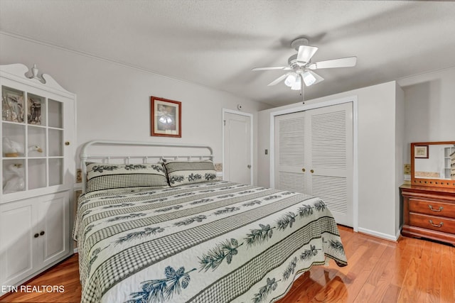 3178 N Clear Fork Rd, Sevierville, TN 37862 - bedroom with baseboards, ceiling fan, light wood finished floors, and a closet