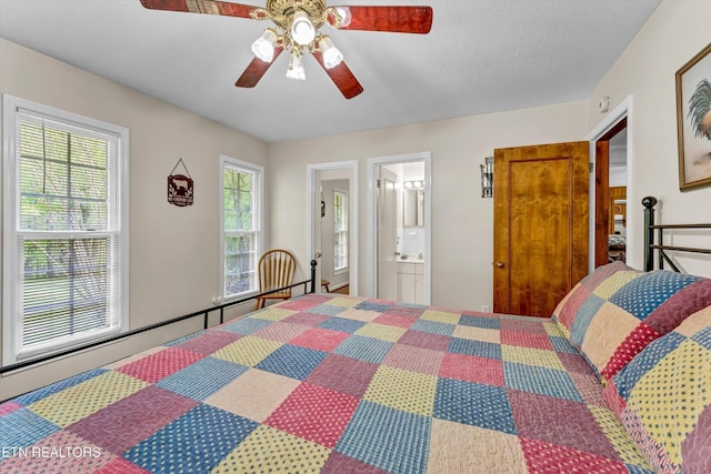 3178 N Clear Fork Rd, Sevierville, TN 37862 - bedroom with a ceiling fan and ensuite bath