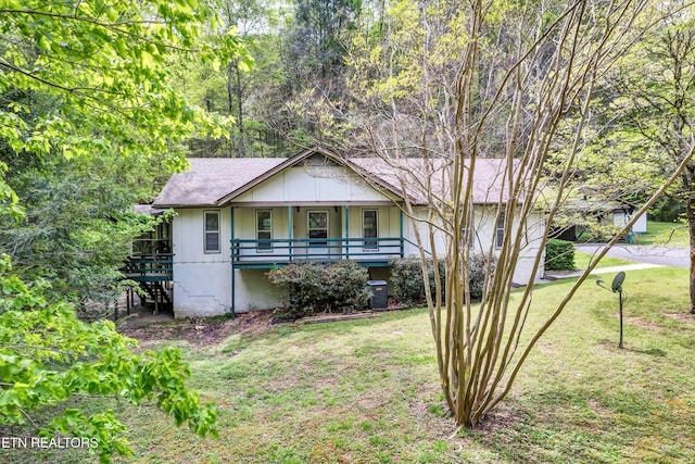 3178 N Clear Fork Rd, Sevierville, TN 37862 - view of front of house with covered porch, central AC, stairs, and a front yard