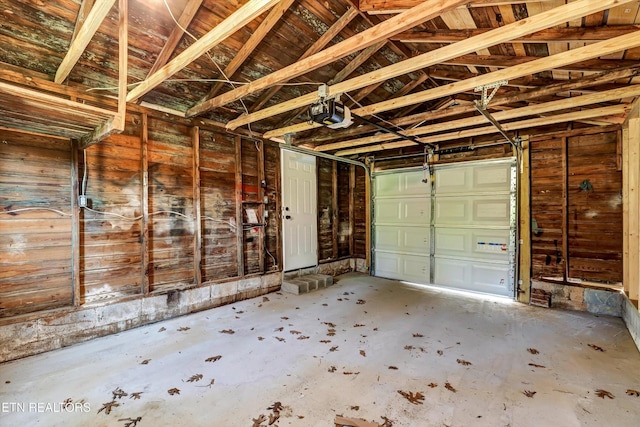 garage featuring a garage door opener
