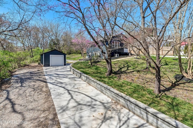 exterior space with concrete driveway