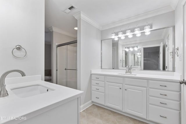 bathroom featuring vanity, tile patterned floors, a shower with door, visible vents, and ornamental molding