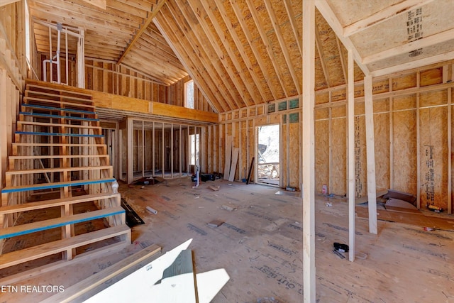 misc room with high vaulted ceiling